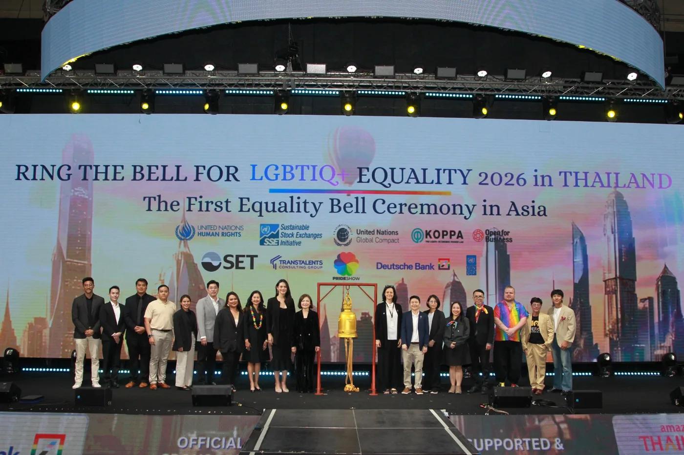 Dignitaries and ceremony participants on stage with the golden bell under the Ring the Bell for LGBTIQ+ Equality 2026 backdrop at Pride Show 2026